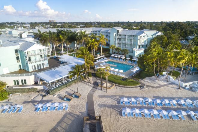 Hotel Exterior View with Beach and Pool Area
