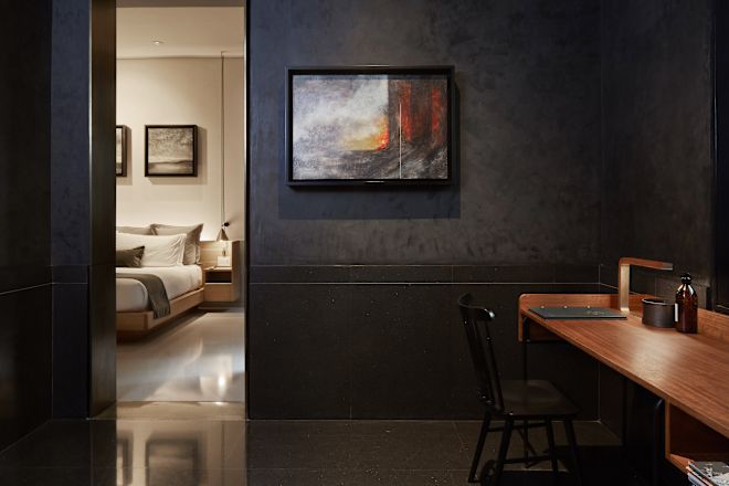 Work desk area and open door to bedroom.