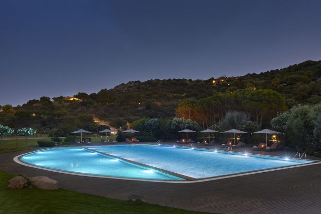 Lit Outdoor Pool at Night