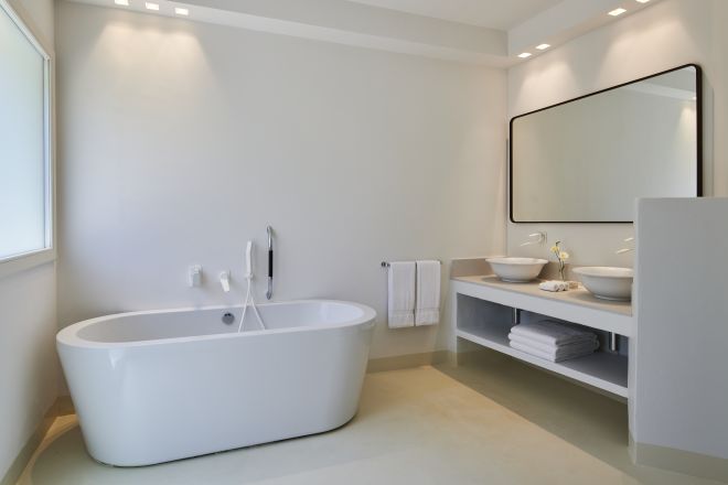 Bathroom with Dual Vanity Area and a Bathtub