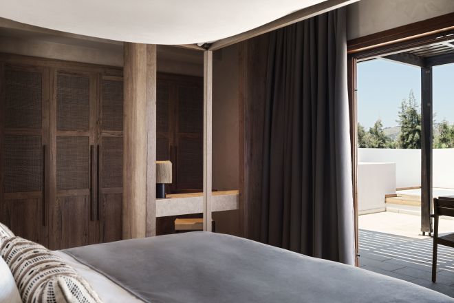 Large Bed in a King Junior Suite with Jetted Tub