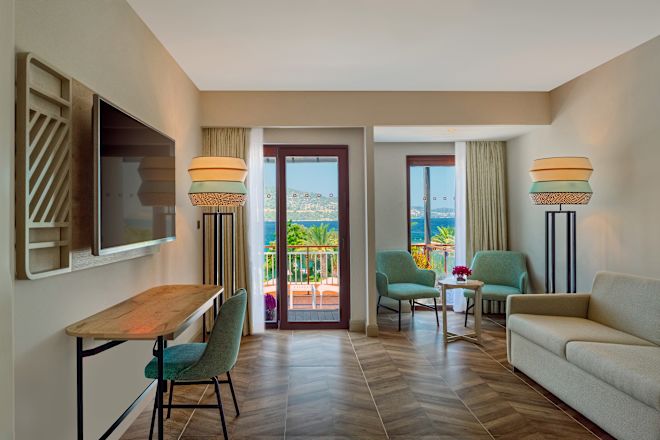 suite living area with desk