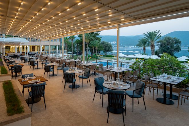 Restaurant area with tables and chairs