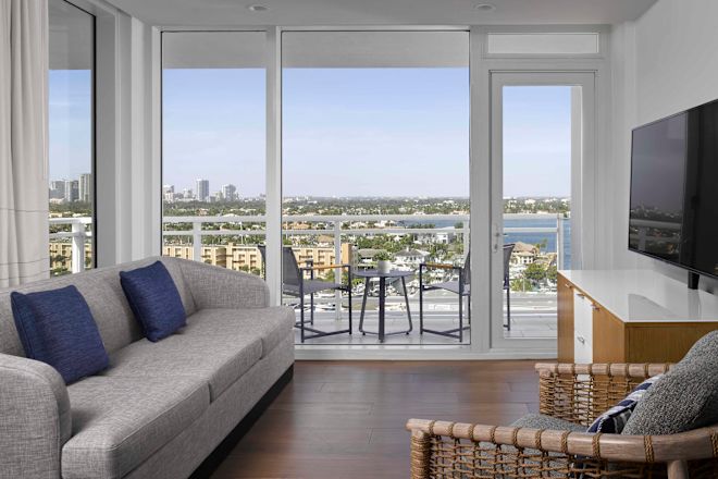 Suite Living Area with Water View from Balcony