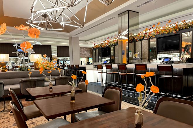 lobby bar decorated with orange and red flowers