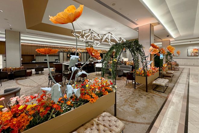 lobby bar decorated with orange and red flowers