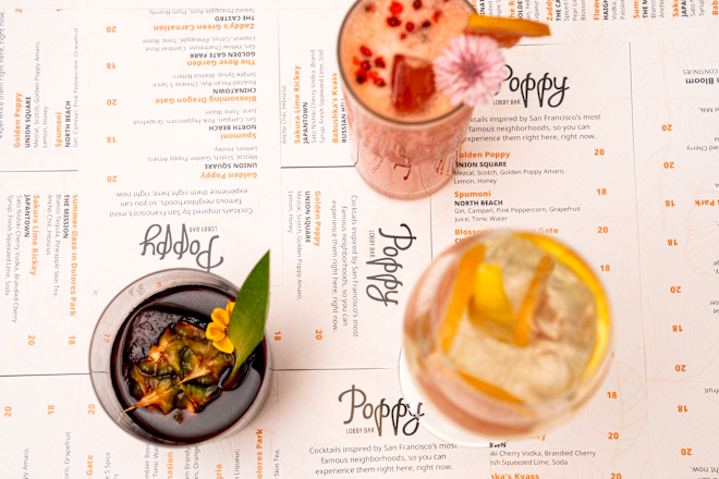 Cocktails Sitting on Top of a Menu at The Lobby Bar