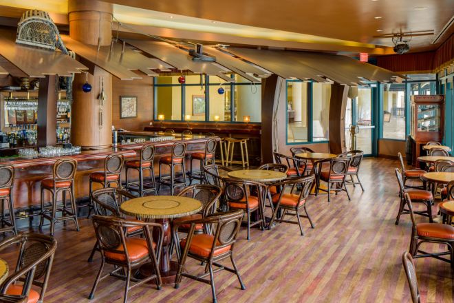 Bar area with tables and chairs