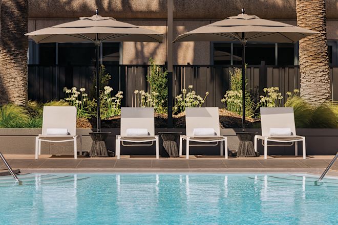 outdoor pool and lounge chairs