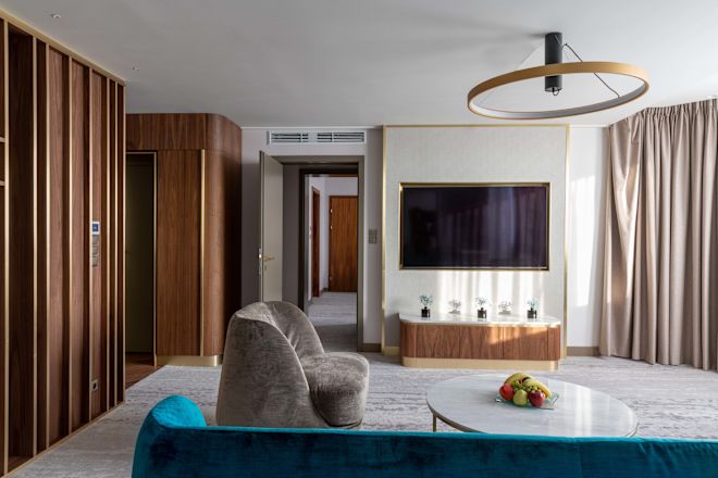 Royal Suite Living Area with sofa, chair and tv