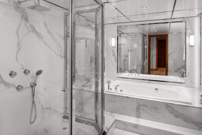 Mirror Bathtub and Separate Shower in Suite