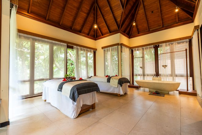 Dual Massage Tables at the Spa and a Bathtub
