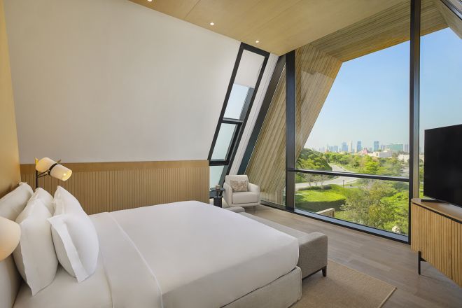 Large Bed in a Room with Garden View