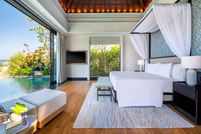King bed with pool view