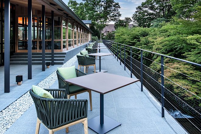 Outdoor terrace with tables and chairs
