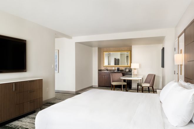 Suite with King Size Bed, TV, Work Desk, and Wet Bar