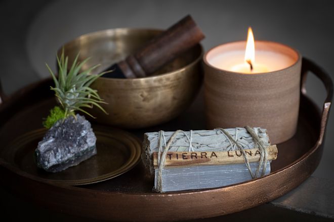 Close-up of spa treatments and candle