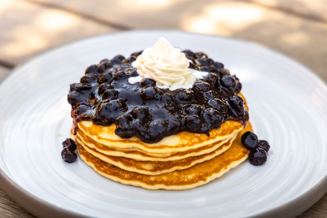 Pancakes piled on plate