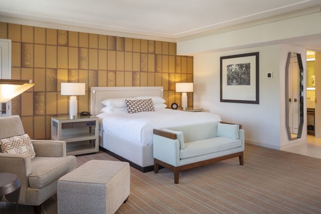 Guestroom with KIng Bed and Lounge Chair