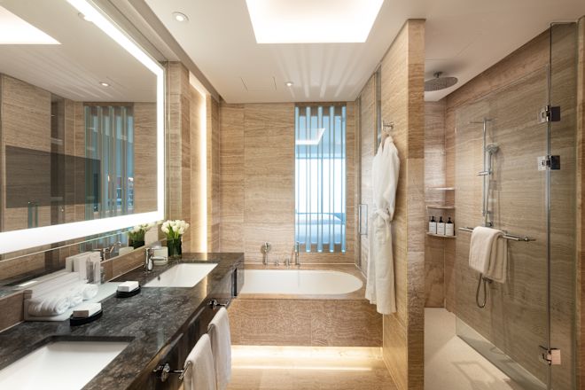 Executive Bathroom with Dual Vanity, Shower, and Tub