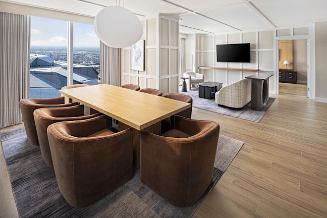 Well-appointed suite with dining area and lounge