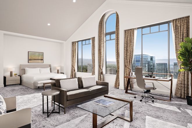 Premium Suite Lounge Area with Couch and Work Desk
