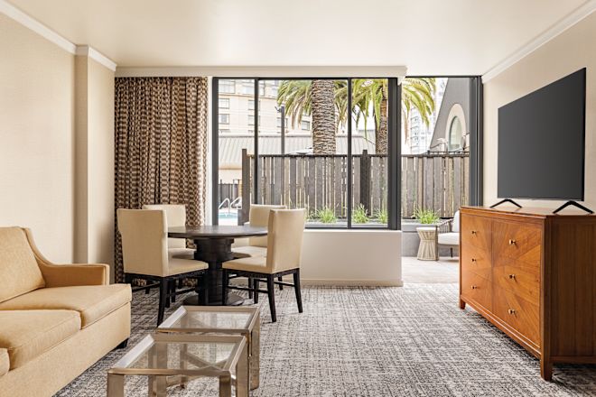 Lounge area with comfortable seating and TV