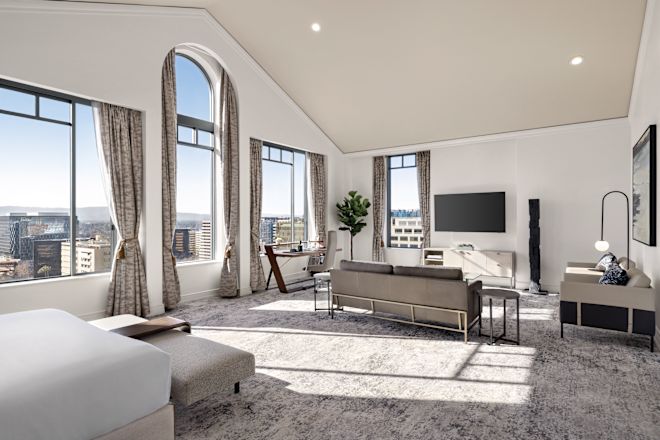 Premium Suite Living Area with Couch and TV