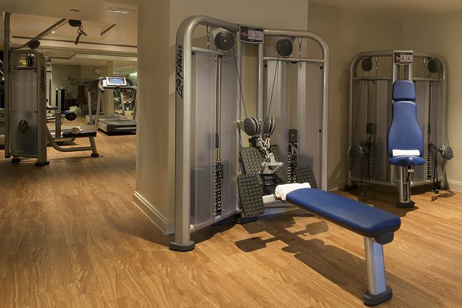 Fitness center with bench and resistance machines