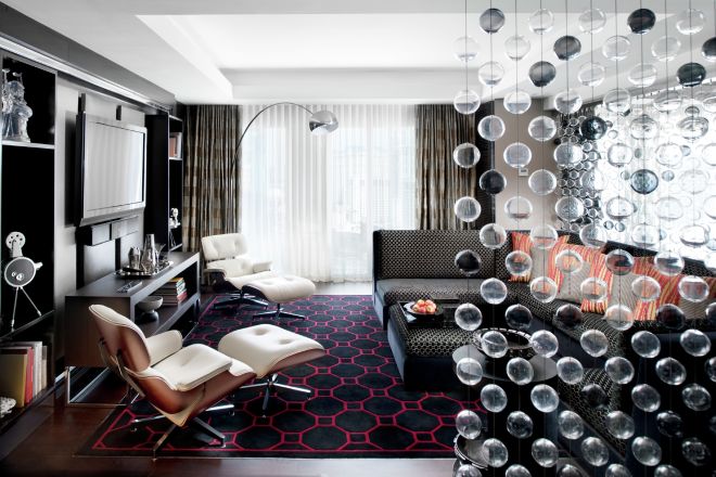 Presidential Suite Media Room with large lamp and glass balls hanging from ceiling