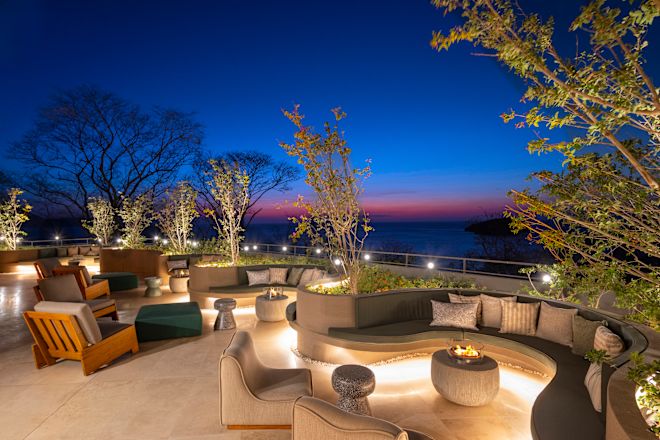The Terrace Restaurant Terrace with Fire Pits at Night