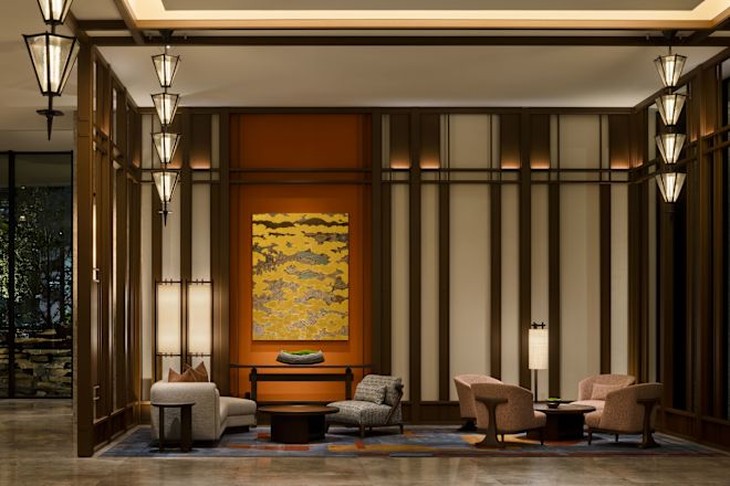 Lobby area with comfortable seating area and art on wall