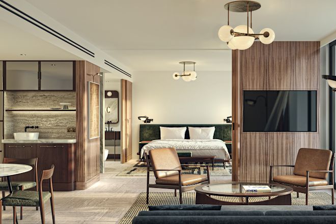 Zimmer mit offenem Wohnbereich, Minibar und großem Bett