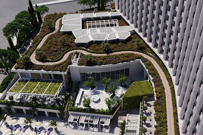 Luftaufnahme des Hotelgebäudes mit Gartenbereich