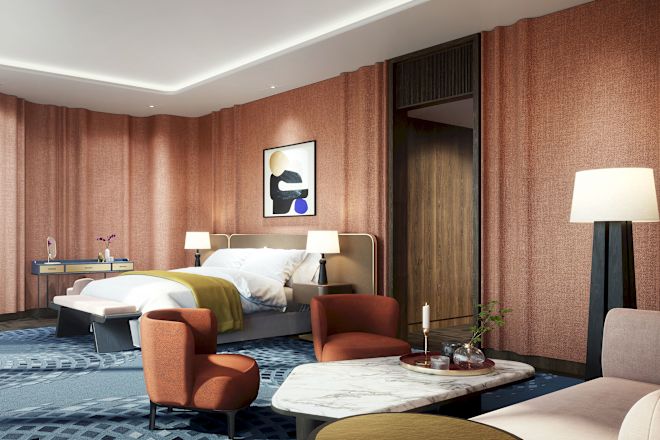 Presidential Suite Master Bedroom With TV And Seating