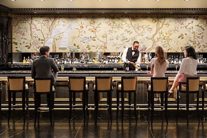 Rendering of bar with 3 guests and a bartender
