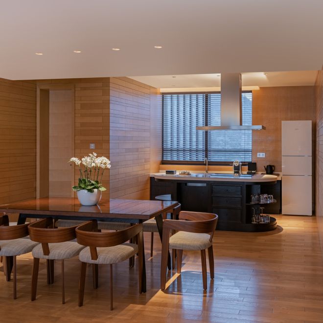 Two Bedroom Presidential Suite Dining Area with table and chairs