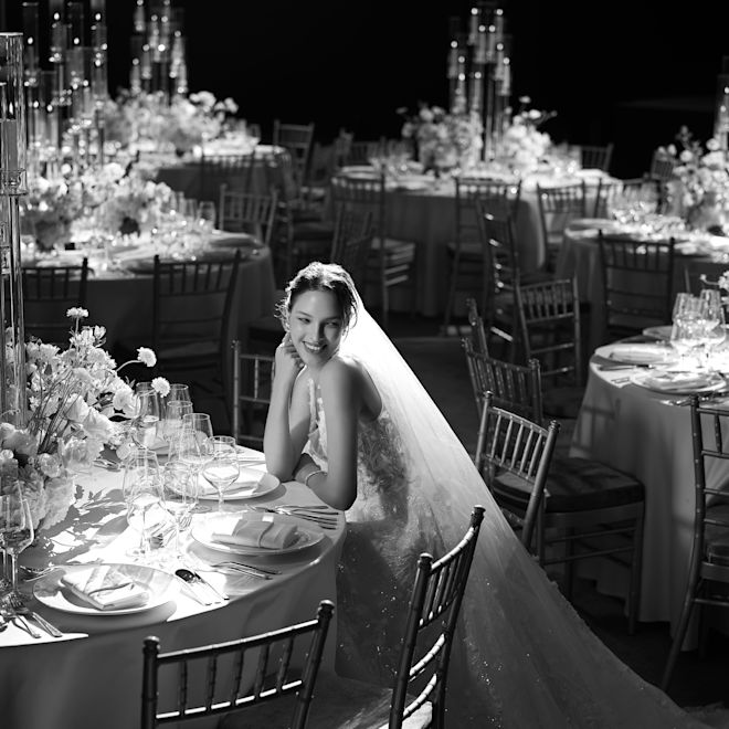 Black and White Photo of a Bride in a Ballroom on Her Wedding Day