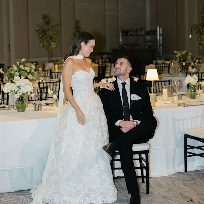 Bride and Groom  in a Ballroom Setup for Dining on Their Wedding Day