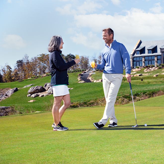 Two golfers playing on short course