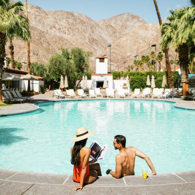 A couple relaxing in a pool