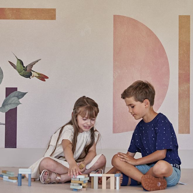 Boy and Girl Playing with Jenga BLocks