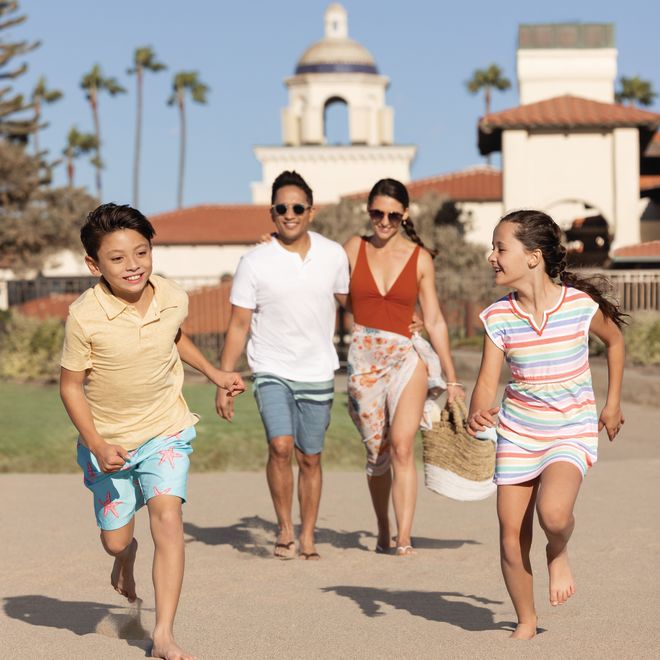 Family Walking on the Beach