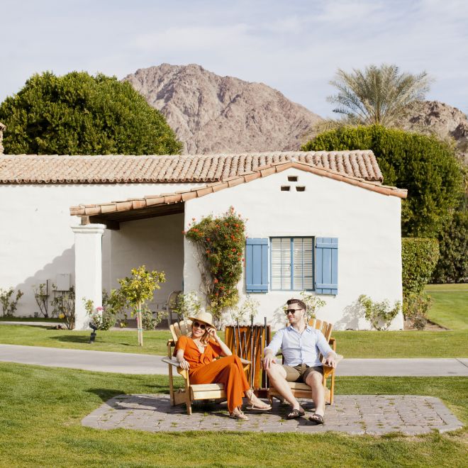 Man and woman relaxing outside
