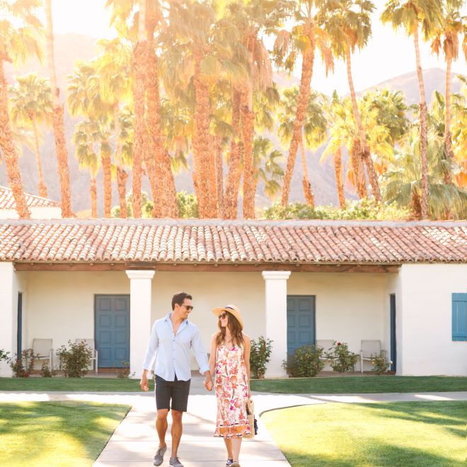 Man and woman walking outside