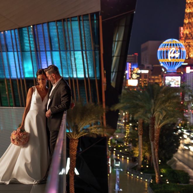 Couple on the Ballroom Balcony Overlooking the Las Vegas Strip