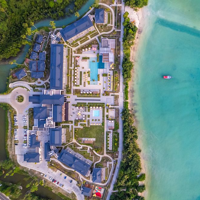 Aerial View of Hotel Exterior and Beach Area