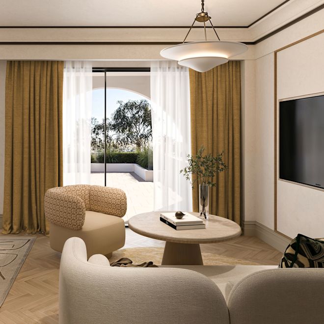 พื้นที่เลานจ์ในห้องพักพร้อมโต๊ะ เก้าอี้ และเตียง