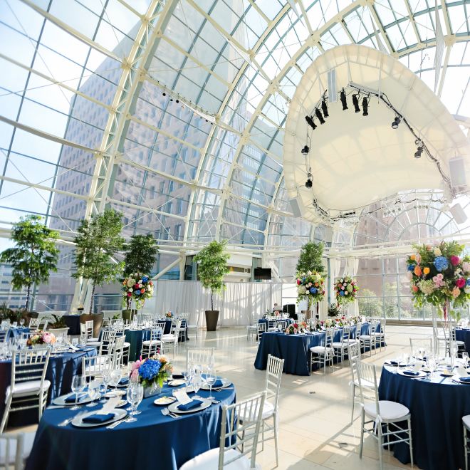 atrium wedding setup with round tables