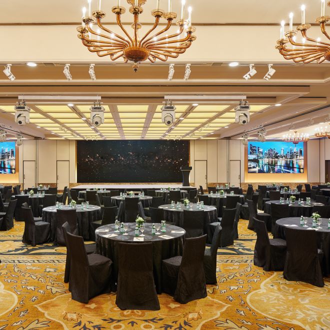 Royal Pavilion Ballroom setup for meeting with round tables